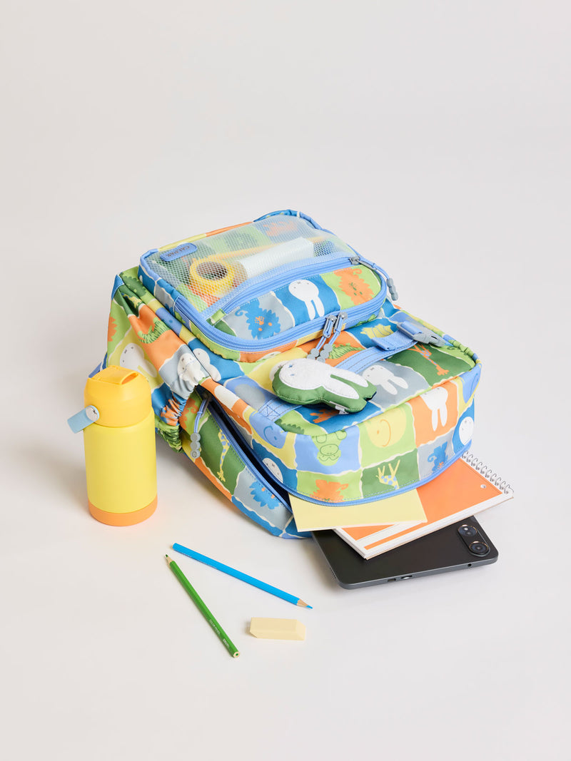 Stationary and CALPAK Kids Medium Backpack with Miffy and blue colorful animal pattern on a white background