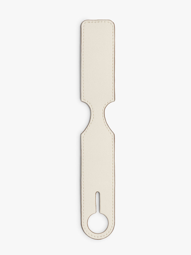 CALPAK Personalized Luggage Tag in beige Buttercream laid flat on a white background