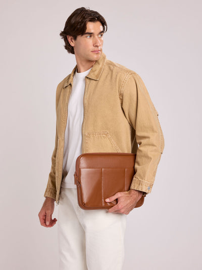 Light Honey Brown vegan leather CALPAK Luka 14in Laptop Sleeve with a zippered top and a front pocket, shown against a plain white background; ALL2401-HONEY-BROWN-PU view 2