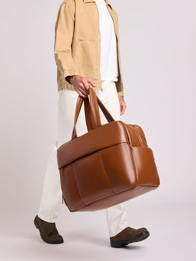 Honey Brown CALPAK Luka Large Duffel in vegan leather with dual top handles, shown against a plain white background; DLL2201-HONEY-BROWN-PU view 2