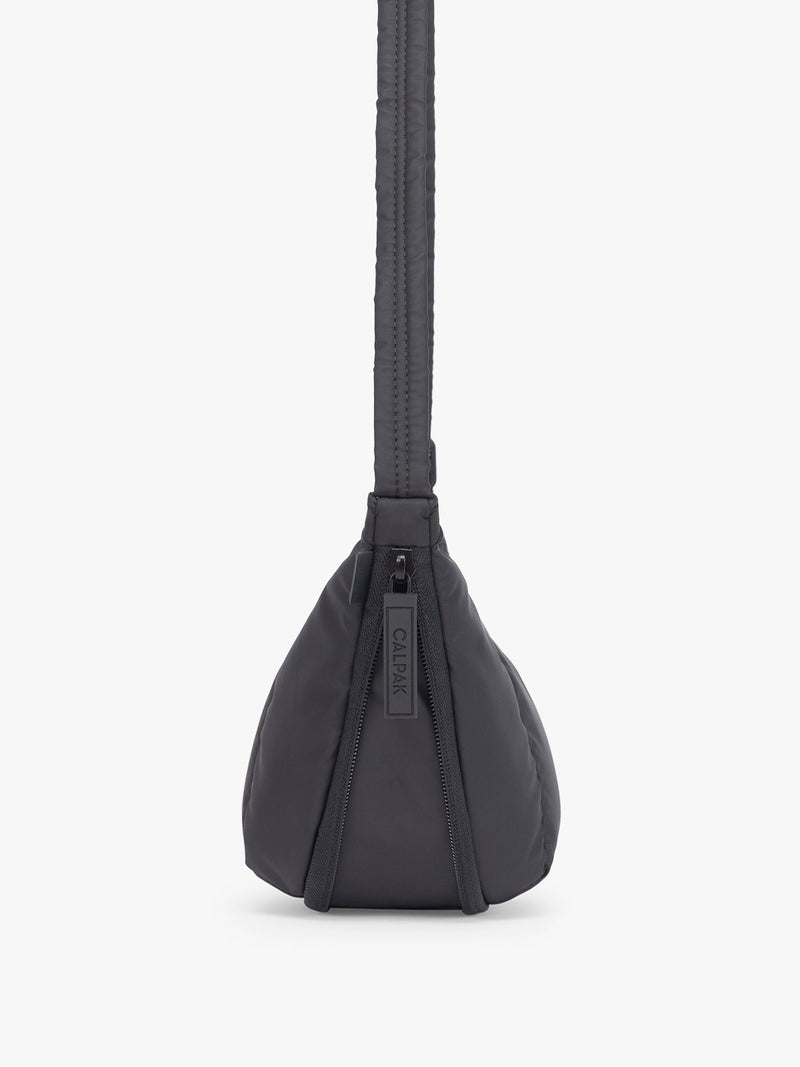 Side expandable zipper of CALPAK Luka Crescent Bag in Black