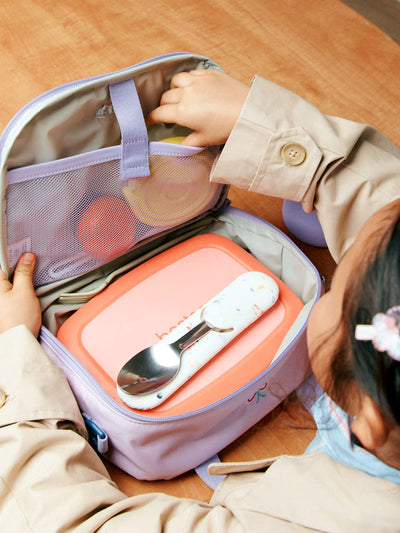 CALPAK Kids Lunch Bag in lavender pink Orchid Pink front view with lavender pink zippers and blue mesh front pocket, water-proof lining, insulated, multiple interior pockets, and back name tag; CKLB2501-ORCHID-PINK  view 2