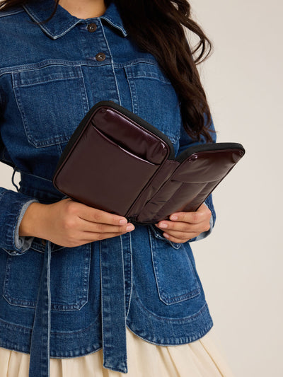 CALPAK Luka Zippered Passport Wallet in maroon Glazed Dark Cherry front view; PZW2301-GLAZED-DARK-CHERRY view 2