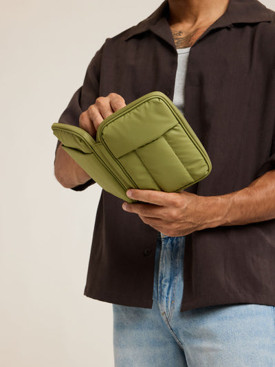 CALPAK Luka Zip Passport Wallet in dark green Pistachio on a white background; PZW2301-PISTACHIO view 2