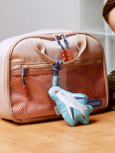 CALPAK Kids Pluffy Bag Charm white Airplane on blue plush front view; APLF2501-AIRPLANE view 2