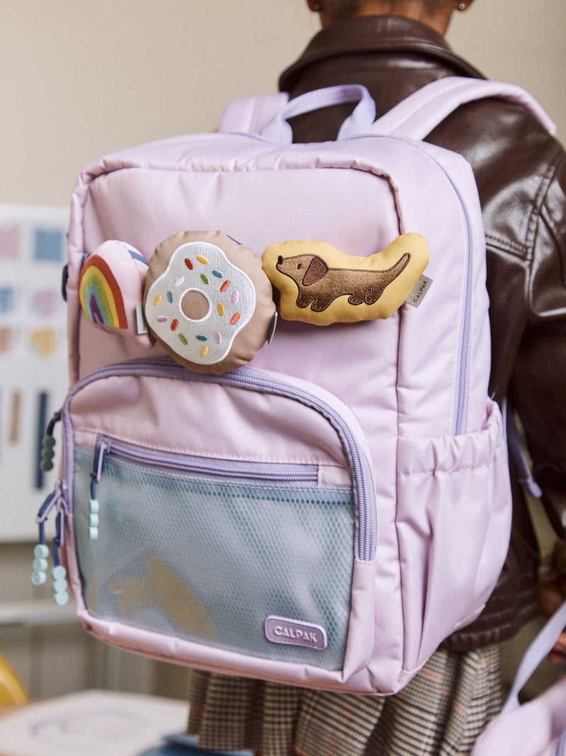 CALPAK Kids Pluffy Bag Charm brown Dog attached to Kids Backpack in Orchid Pink