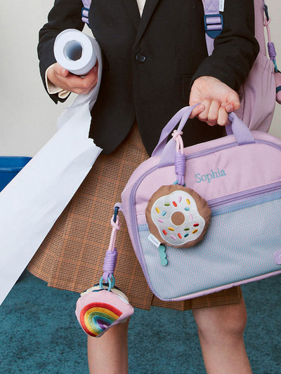 CALPAK Kids Pluffy Bag Charm white Donut with sprinkles on tan plush front view; APLF2501-DONUT view 2
