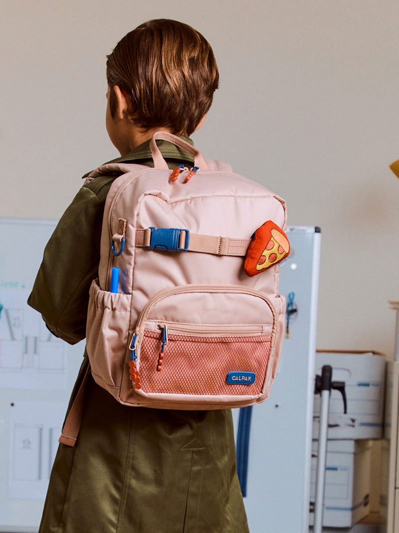 CALPAK Kids Pluffy Bag Charm pepperoni and cheese Pizza on red plush attached to Kids Backpack in Khaki
