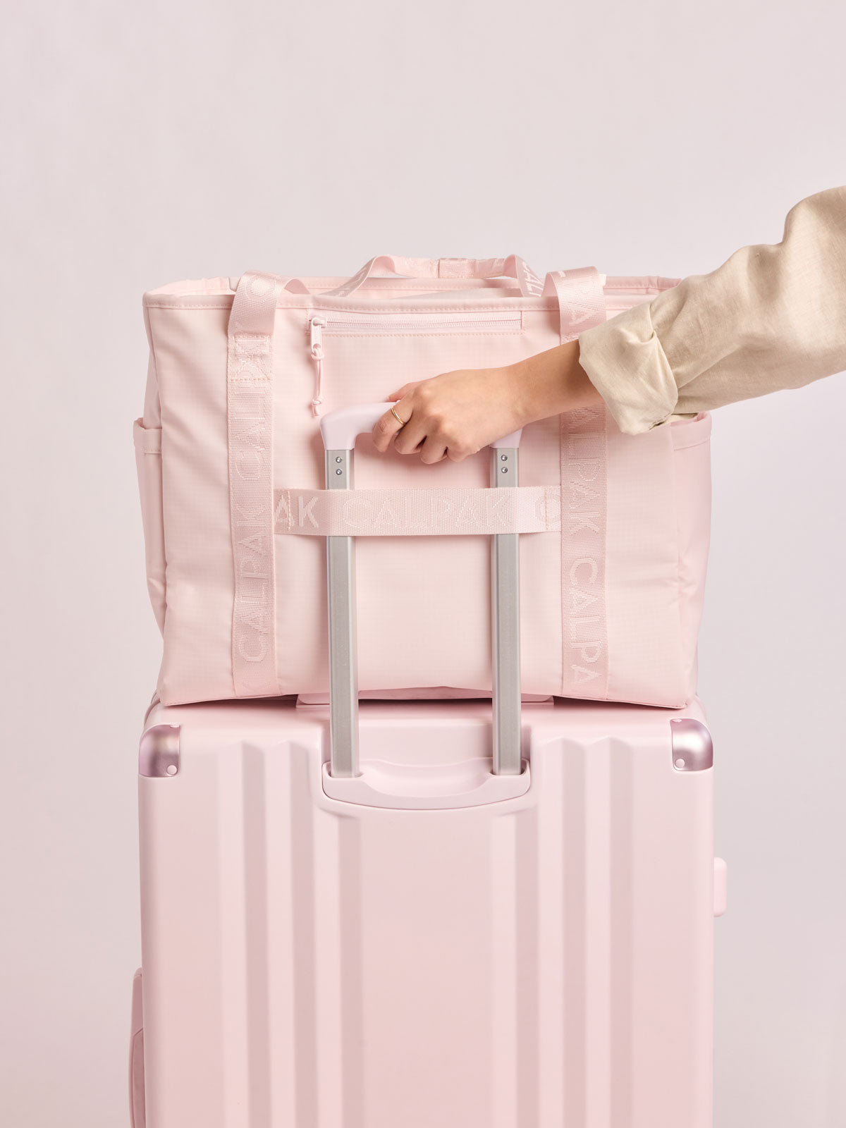 Terra 35L Water Resistant Zip Tote Bag in Shell Pink | CALPAK