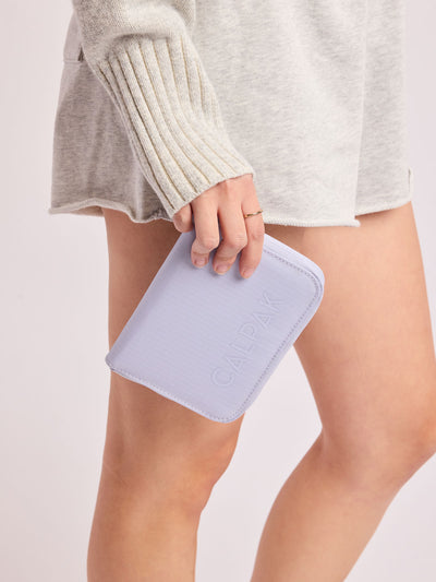 Front side of CALPAK Terra Zip Passport Wallet in light purple Sea Glass ; ATPW2501-SEA-GLASS view 2