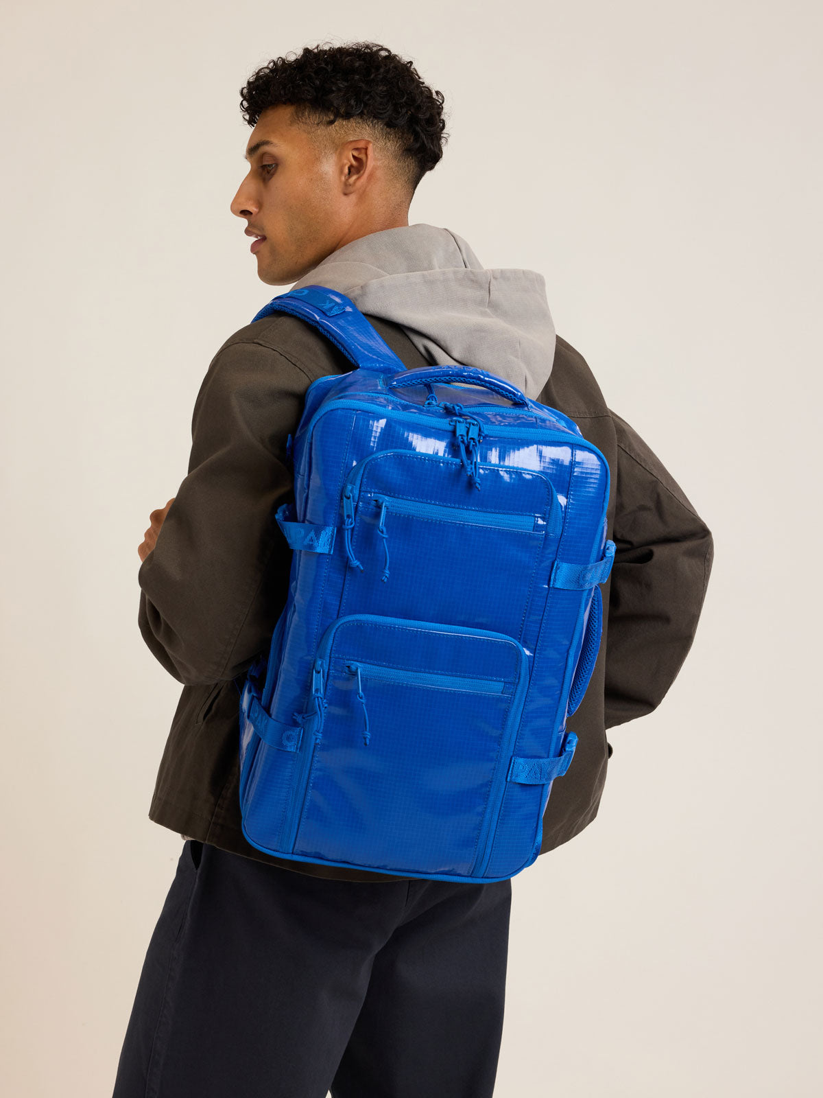 Model with CALPAK Terra 26L Backpack Duffel in blue Cobalt; BPH2201-COBALT