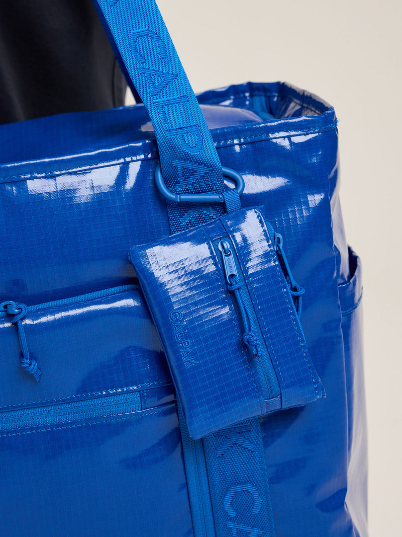 CALPAK Terra Clippable Card Pouch in blue Cobalt clipped on bag