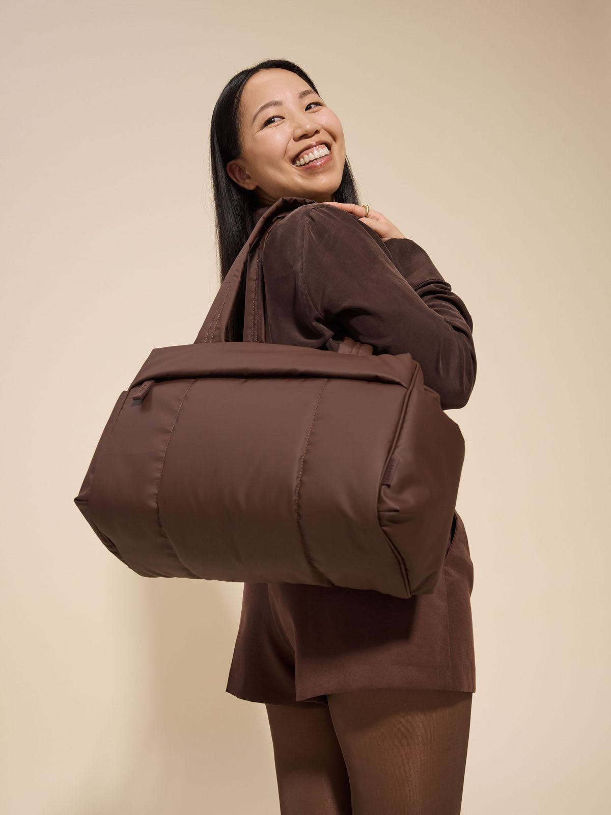 CALPAK Luka Mini Duffel front view in brown monochrome Walnut; DLM2501-WALNUT