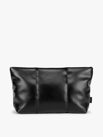 CALPAK black vegan leather pouch bag with a structured rectangular shape and vertical stitched panel details, shown against a plain white background; ZLPM2601-BLACK-PU view 1