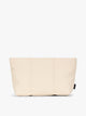 Beige Oatmeal CALPAK Luka 2 Quart Zip Pouch bag with stitched paneling and top zipper, shown against a plain white background; ZLPM2601-OATMEAL