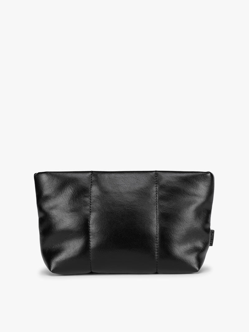 A CALPAK Luka 1 quart black vegan leather pouch bag with a quilted, padded design and a small black brand tag on the right side, shown against a plain white background