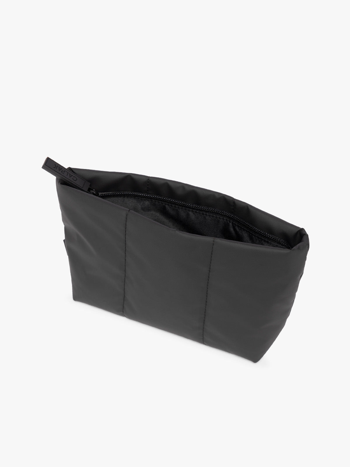 Top and side view of Black colored CALPAK Luka 1 Quart Pouch with vertical stitched paneling and top zipper, shown against a plain white background; ZLPS2601-MATTE-BLACK