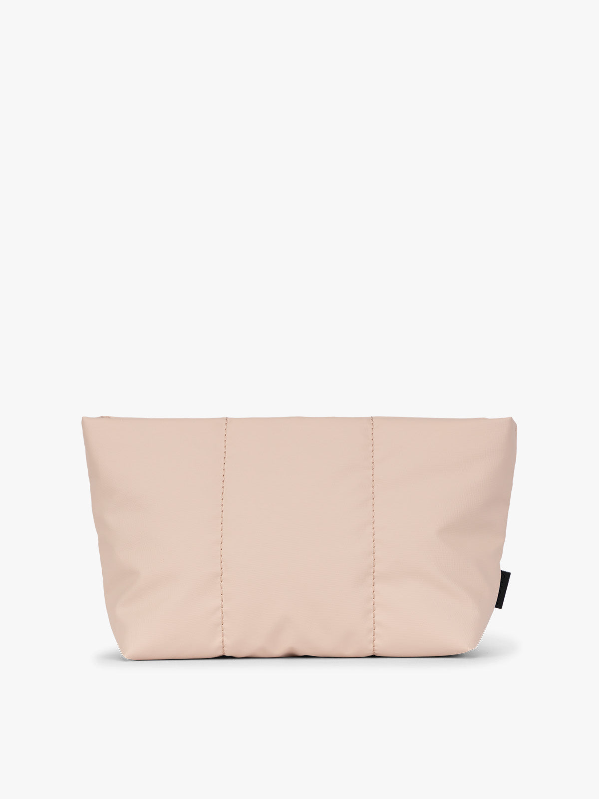 Light pink Rose Quartz colored CALPAK Luka 1 Quart Pouch with vertical stitched paneling and top zipper, shown against a plain white background; ZLPS2601-ROSE-QUARTZ