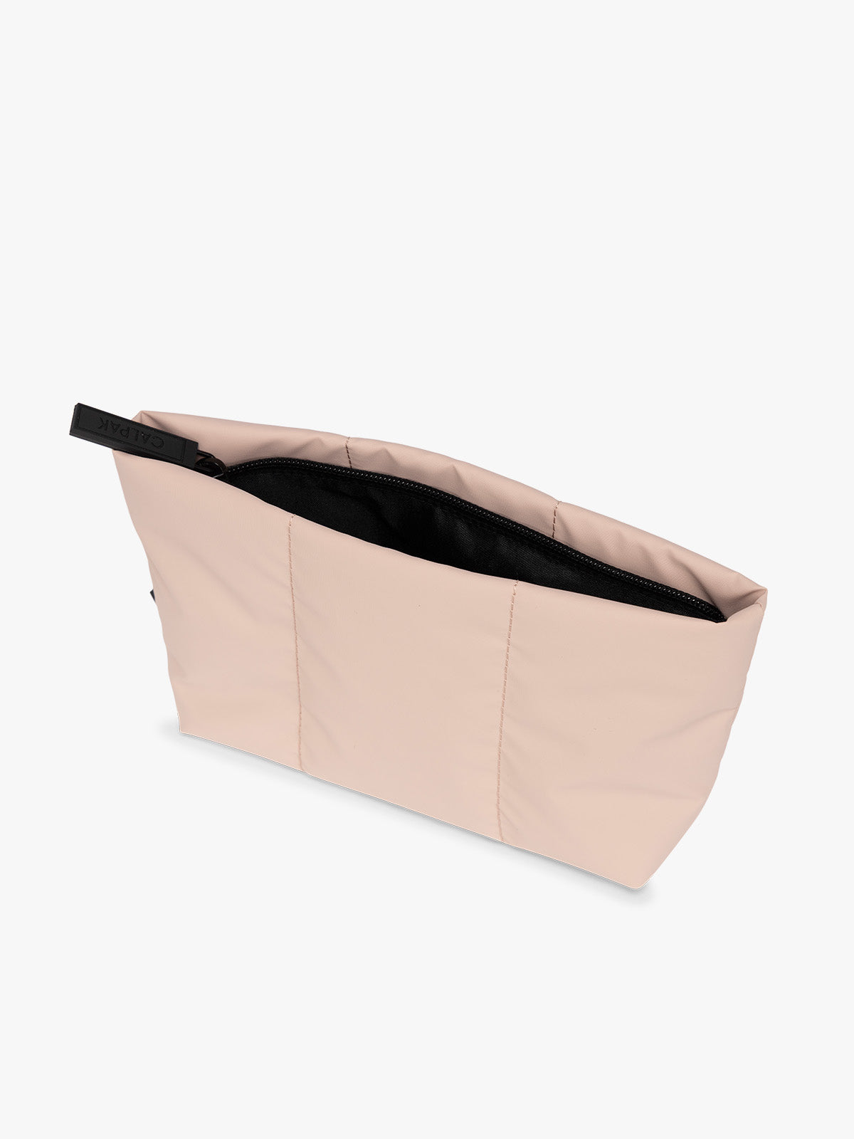 Top side view of light pink Rose Quartz colored CALPAK Luka 1 Quart Pouch with vertical stitched paneling and top zipper, shown against a plain white background; ZLPS2601-ROSE-QUARTZ