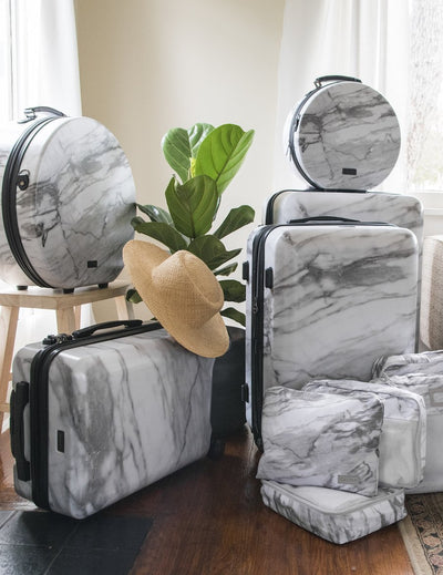 3 piece CALPAK Astyll hard shell white marble matching luggage set with built in TSA locks; LAT3000-MILK-MARBLE