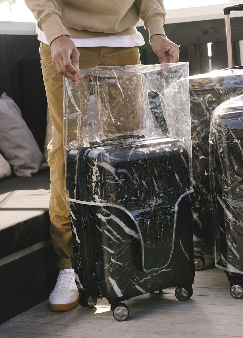clear plastic luggage protector