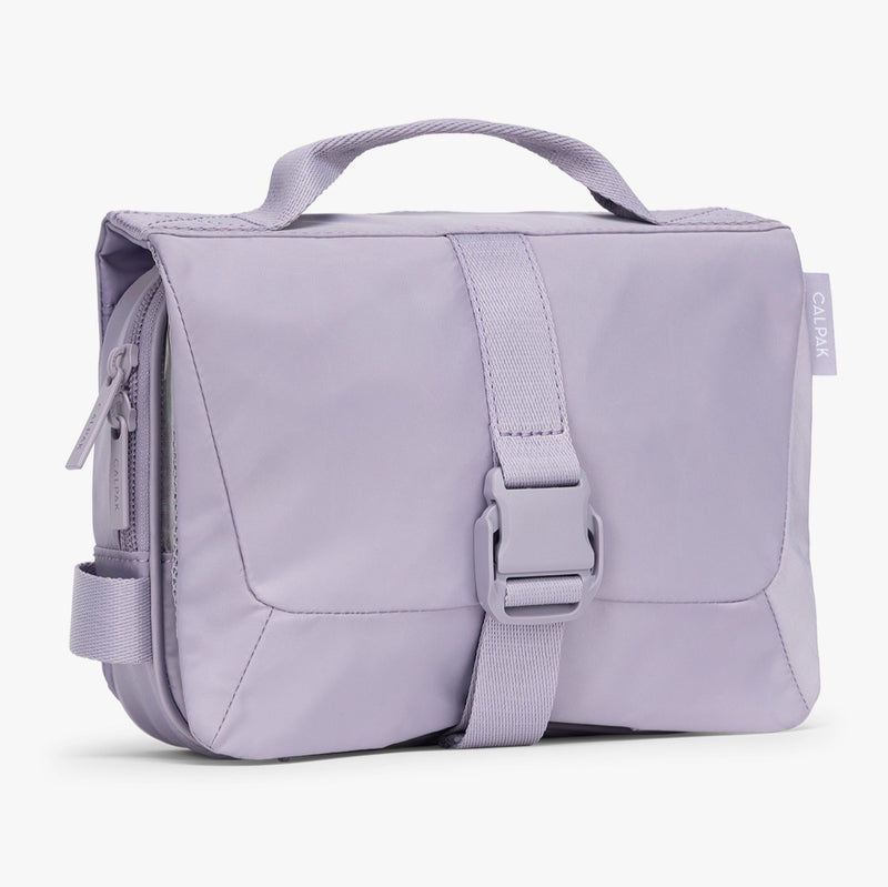 CALPAK Fit Hanging Dopp Kit in purple toiletry bag with a strap on a white background