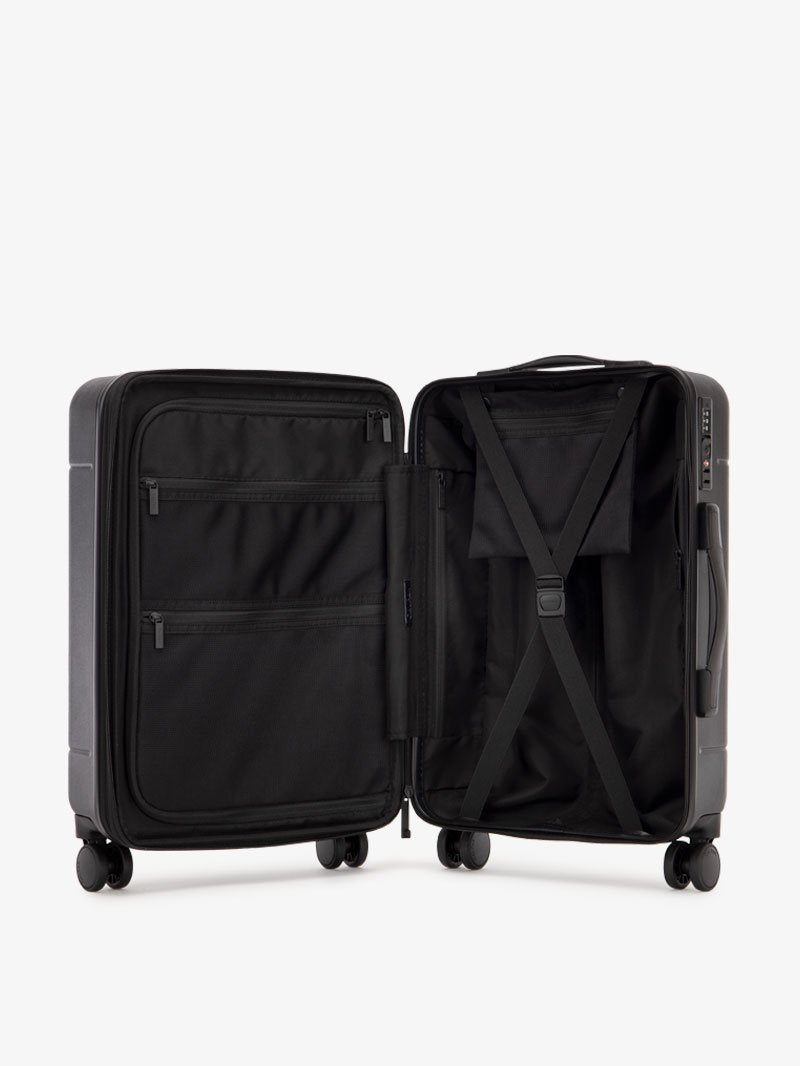 the interior of black CALPAK Hue hard shell carry-on spinner luggage; LHU1020-NP-BLACK