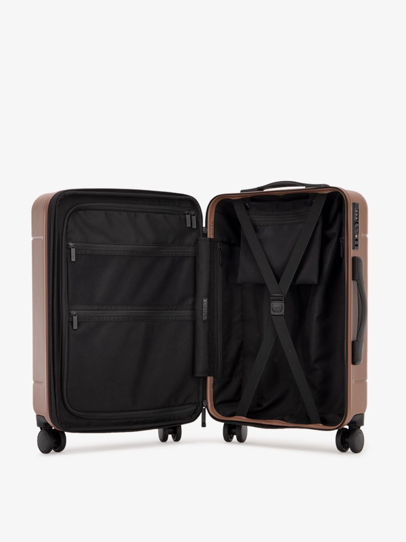 the interior of CALPAK Hue hard shell carry-on spinner luggage in brown hazel color; LHU1020-NP-HAZEL