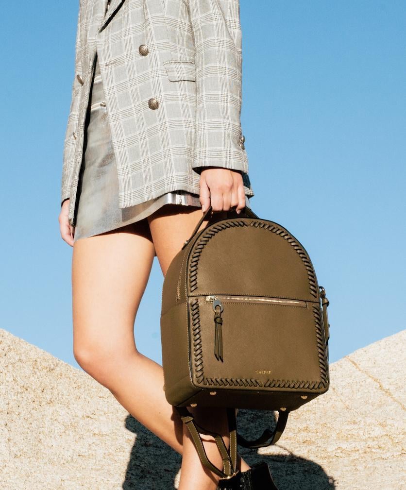 elegant olive green CALPAK Kaya backpack for women
