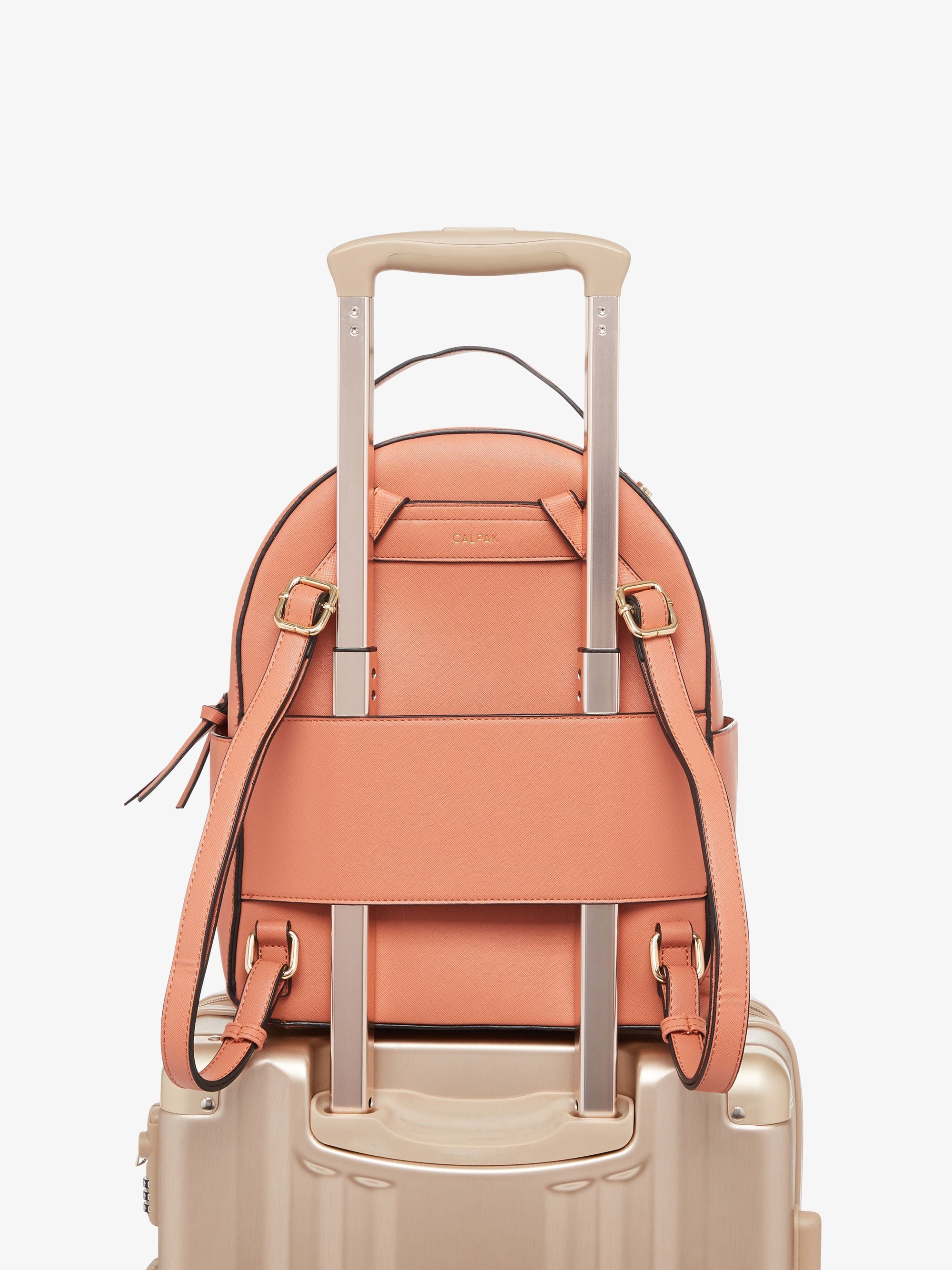 terracotta CALPAK Kaya backpack for women with trolley sleeve