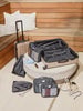 Chocolate CALPAK Starter Bundle 2 piece Luggage Set with 360 spinner wheels, laundry bag, shoe bag and organizers; LCO8000-CHOCOLATE