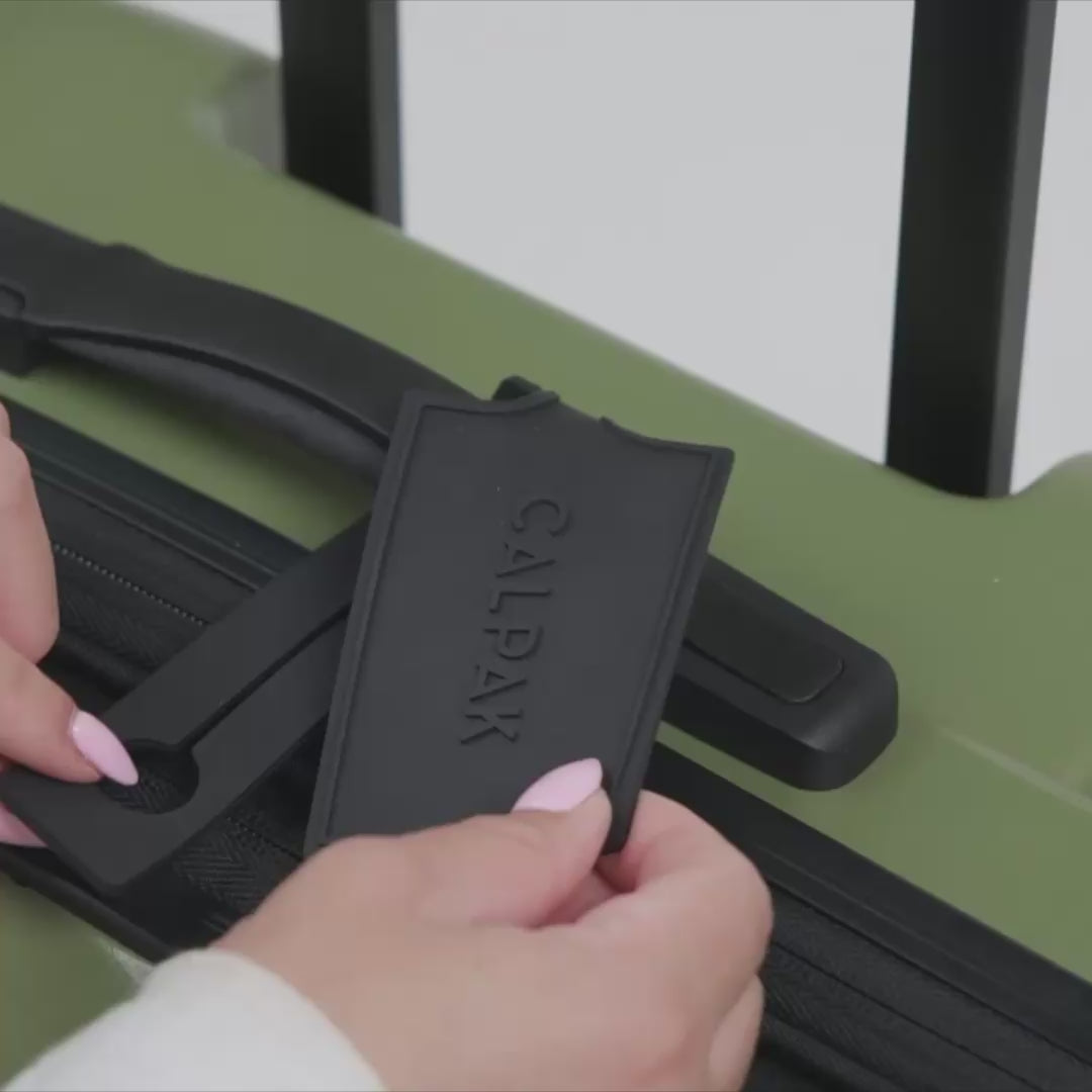 Signature Luggage Tag Included