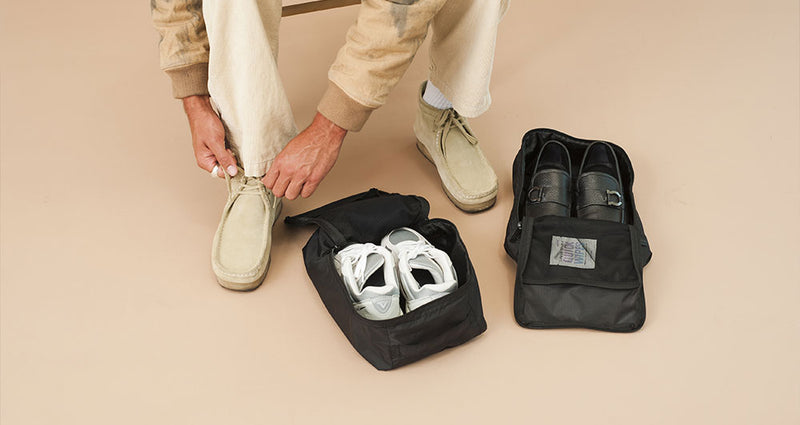 CALPAK Black Shoe Cubes packed with shoes