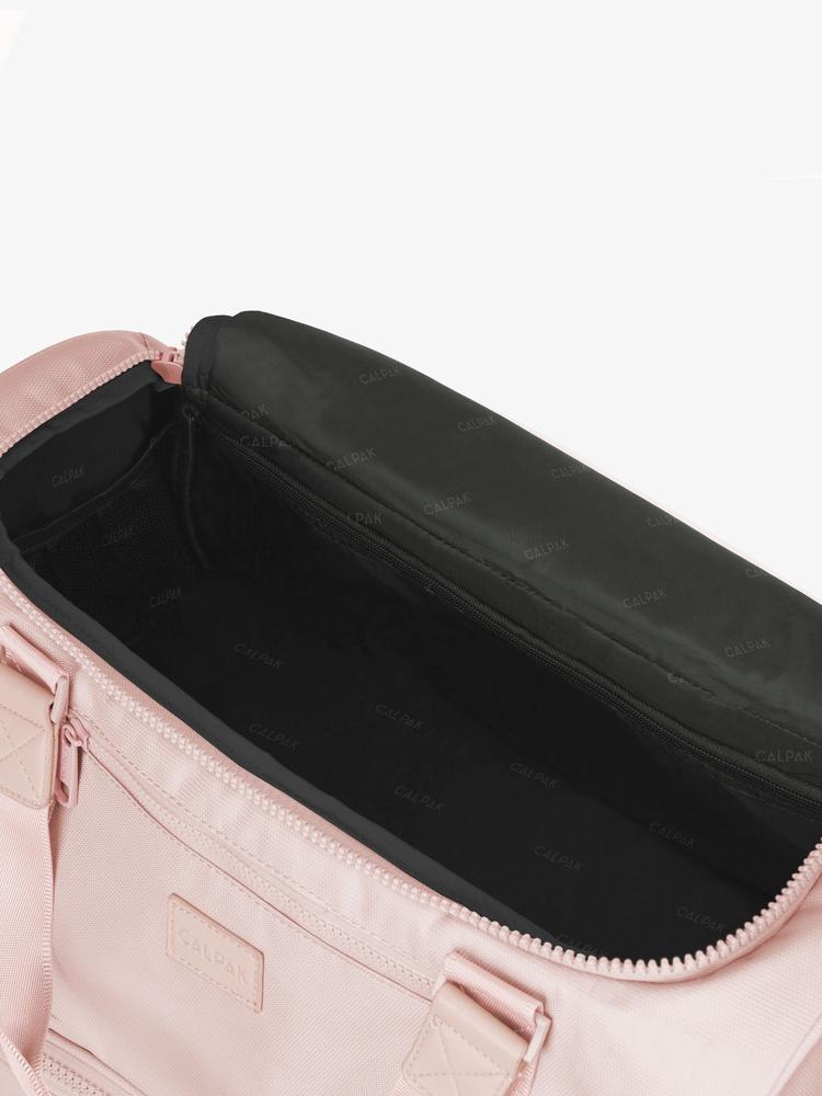 open interior shot of CALPAK Stevyn duffel bag; DST7019-PINK-SAND