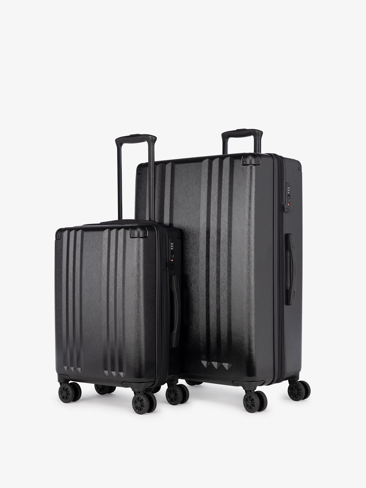CALPAK Ambeur: 2 piece lightweight expandable black hard shell luggage set with carry on
