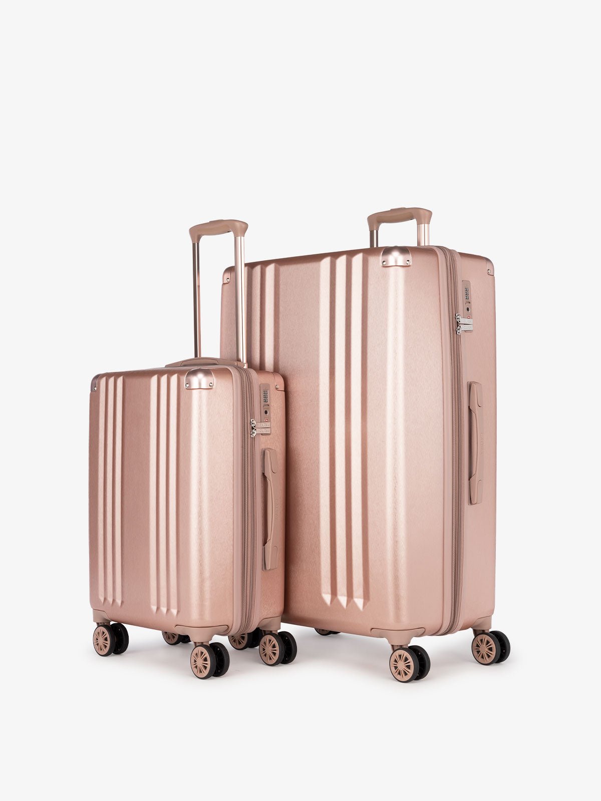 CALPAK Ambeur: 2 piece lightweight expandable rose gold hardside spinner luggage set for women