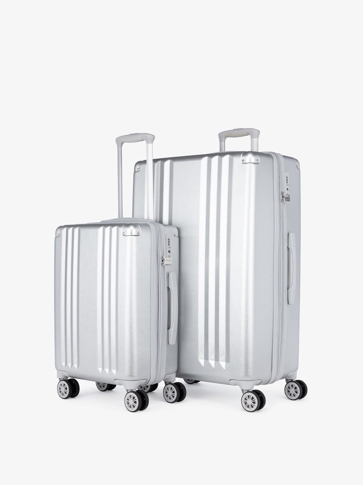 CALPAK Ambeur: 2 piece lightweight expandable silver hard shell luggage set with carry on