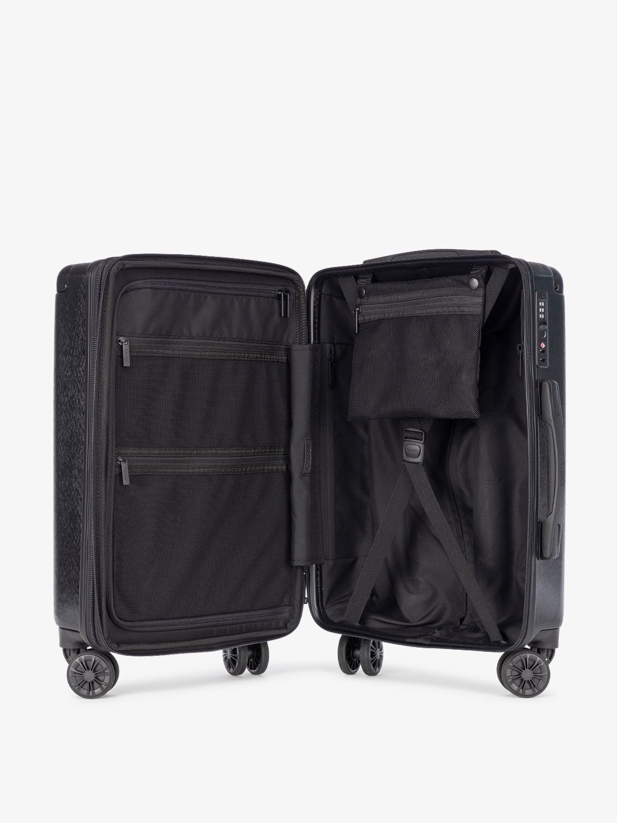 hard sided part of 3 piece suitcase set with compression strap