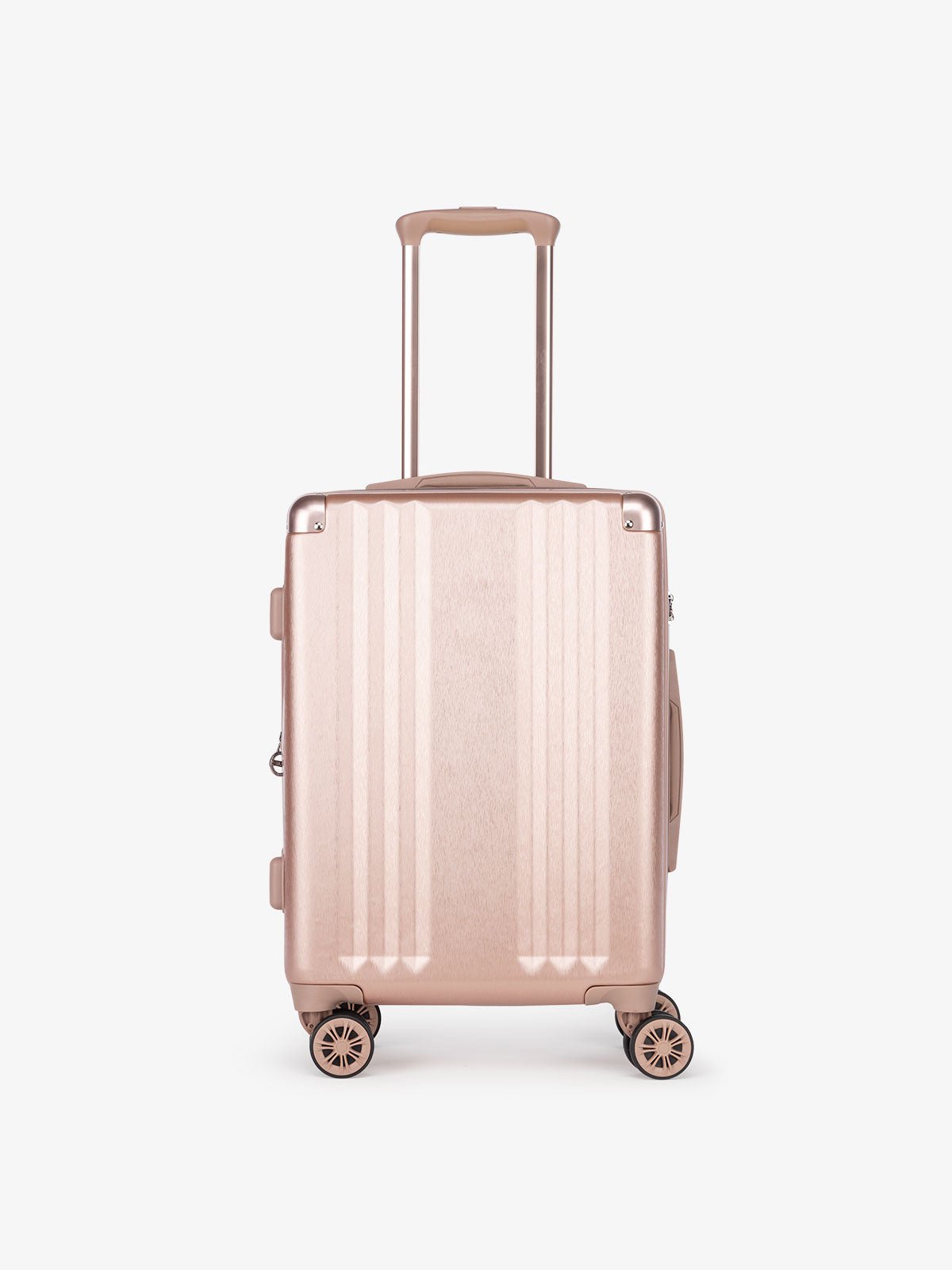rose gold CALPAK Ambeur 22 inch hard shell carry on suitcase as a part of a luggage set