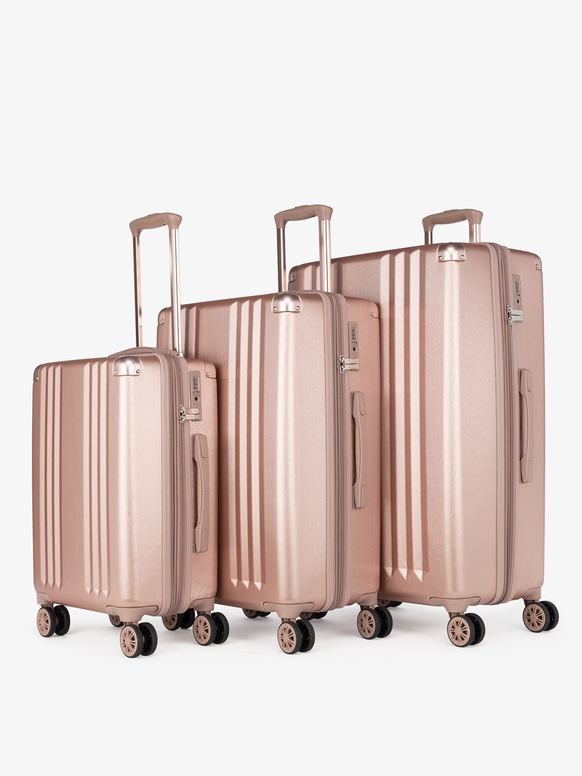 CALPAK Ambeur: 3 piece lightweight expandable rose gold hardside spinner luggage set for women