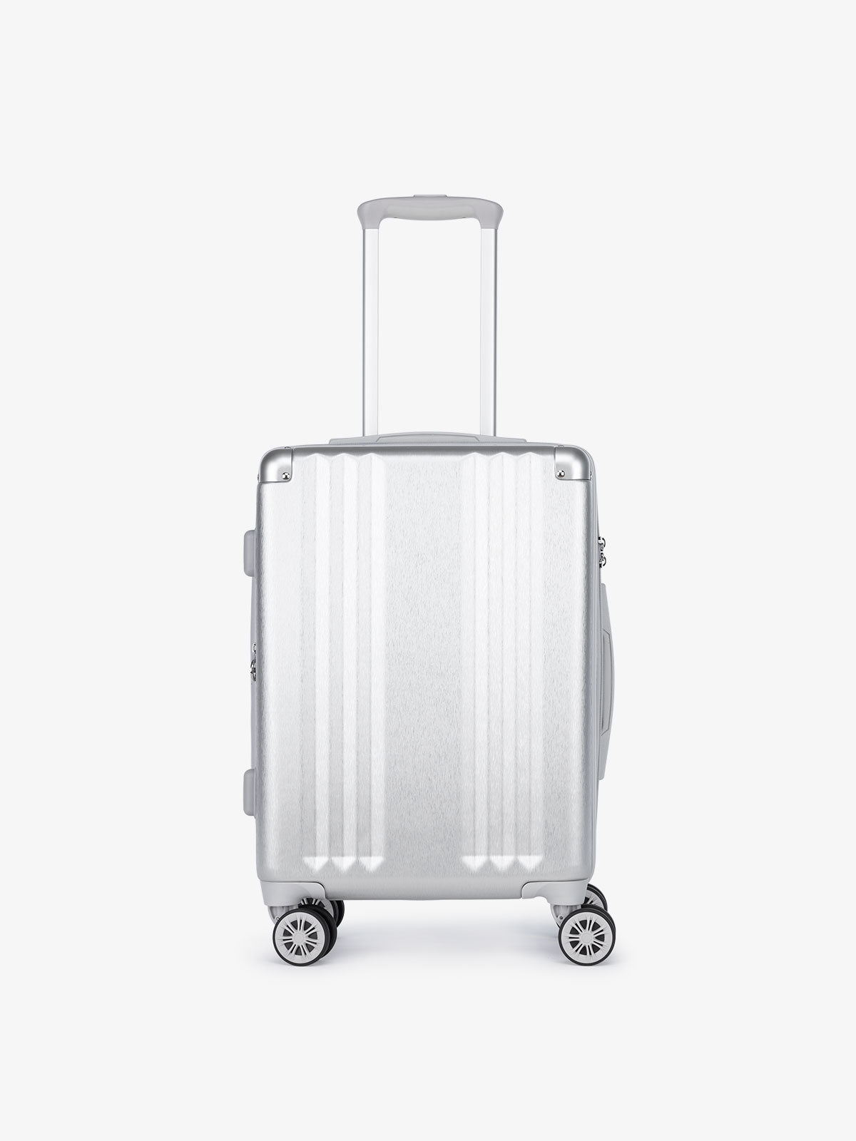 lightweight silver CALPAK Ambeur 22 inch hard shell rolling spinner carry on as a part of a luggage set
