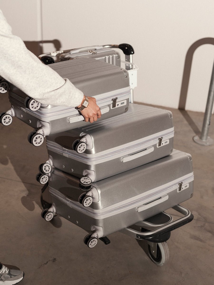 rolling 3 piece Ambeur silver luggage set