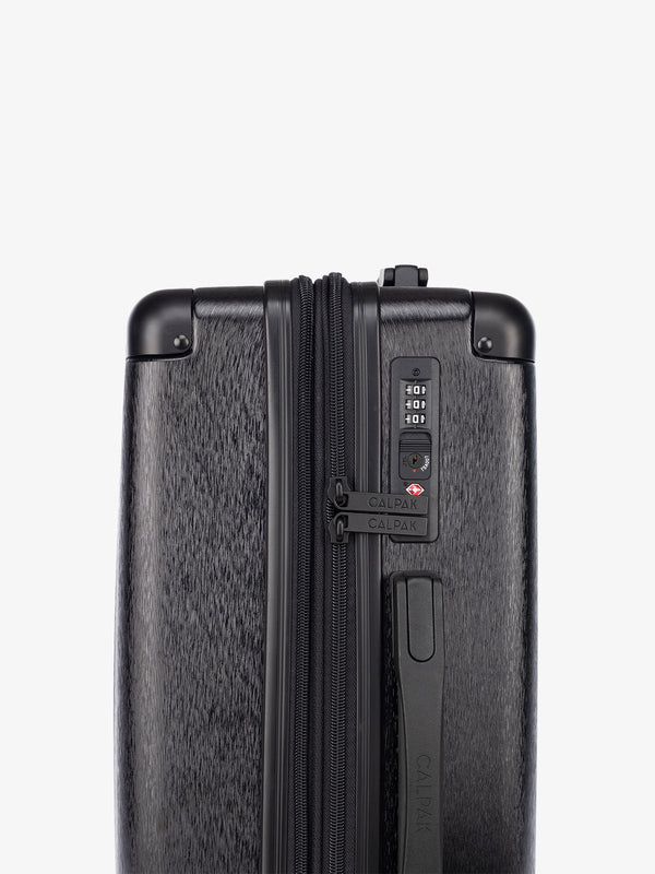TSA lock of black CALPAK Ambeur hardside carry on suitcase