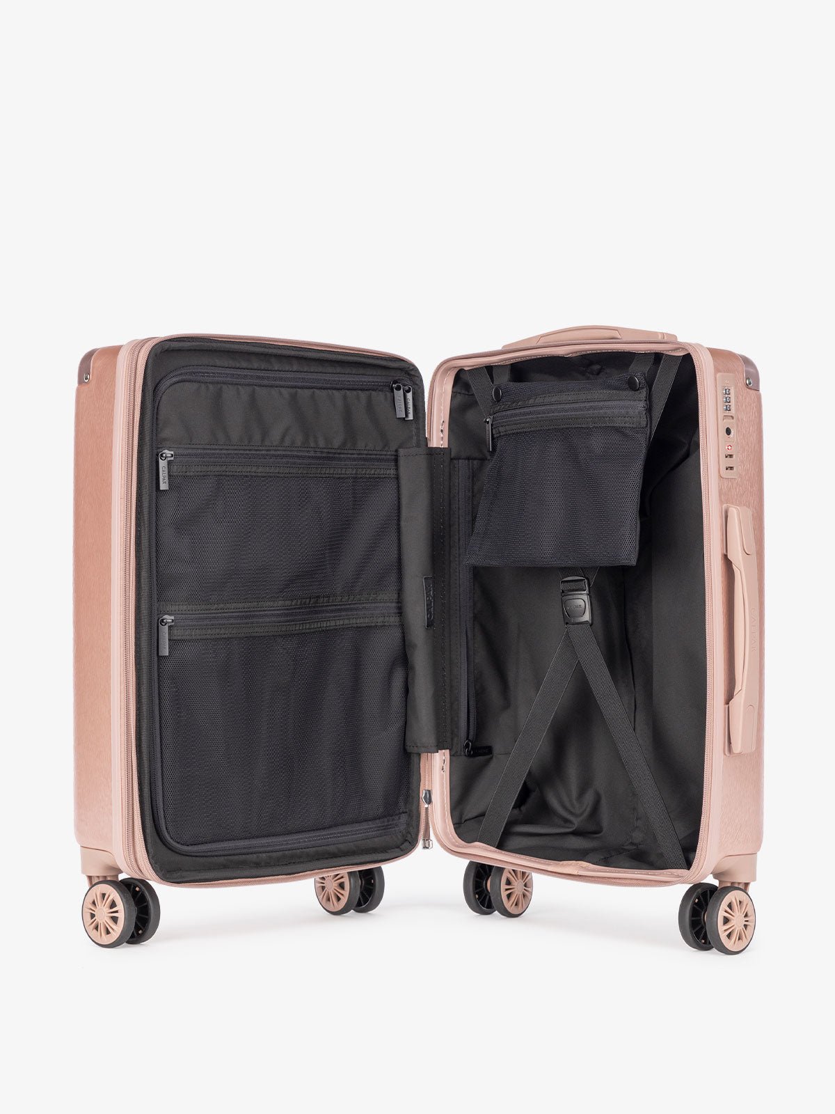 rose gold CALPAK Ambeur hard shell carry on luggage with compression straps