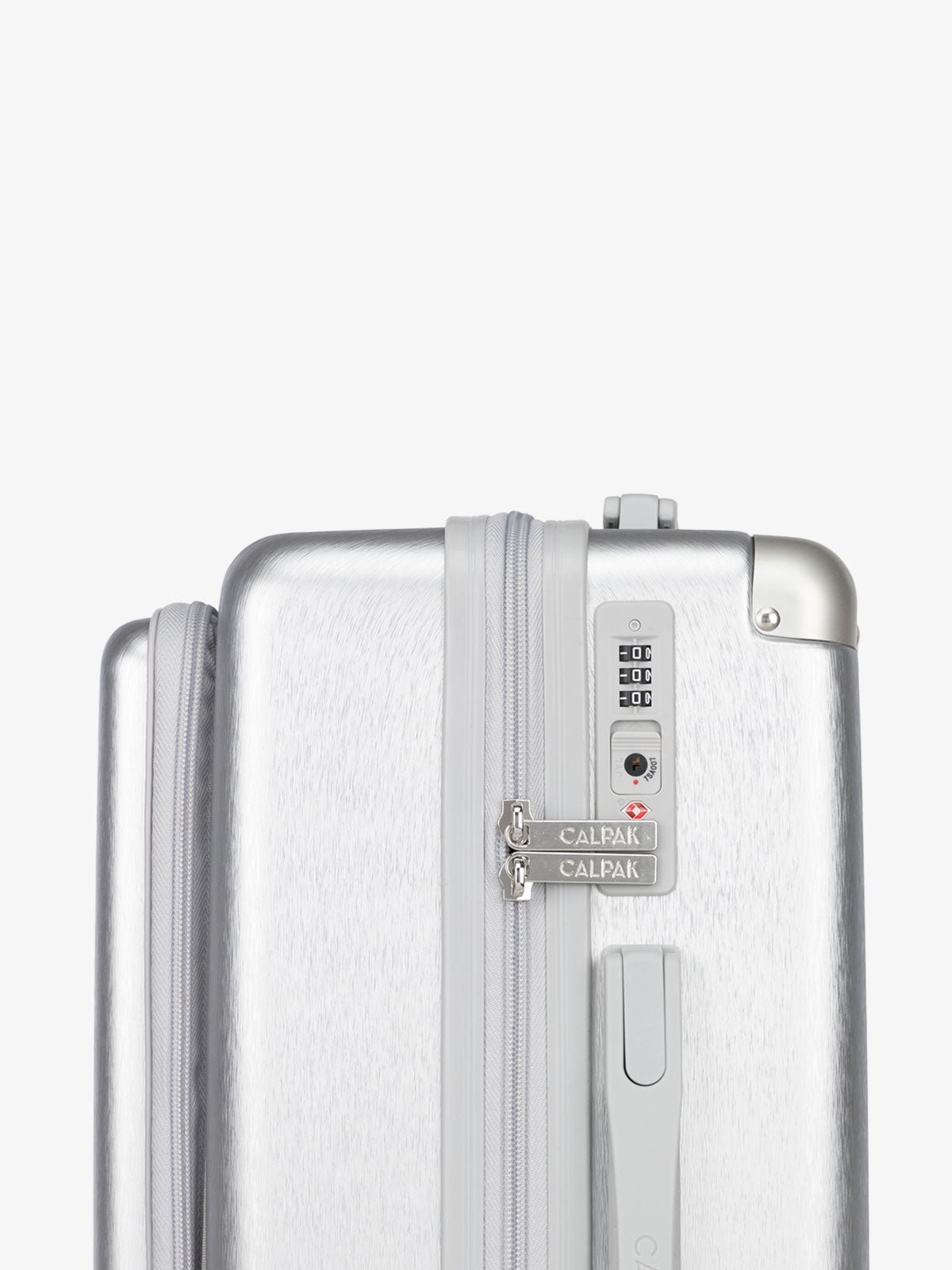 CALPAK Ambuer hardside 21 inch carry-on with front pocket and TSA lock in silver