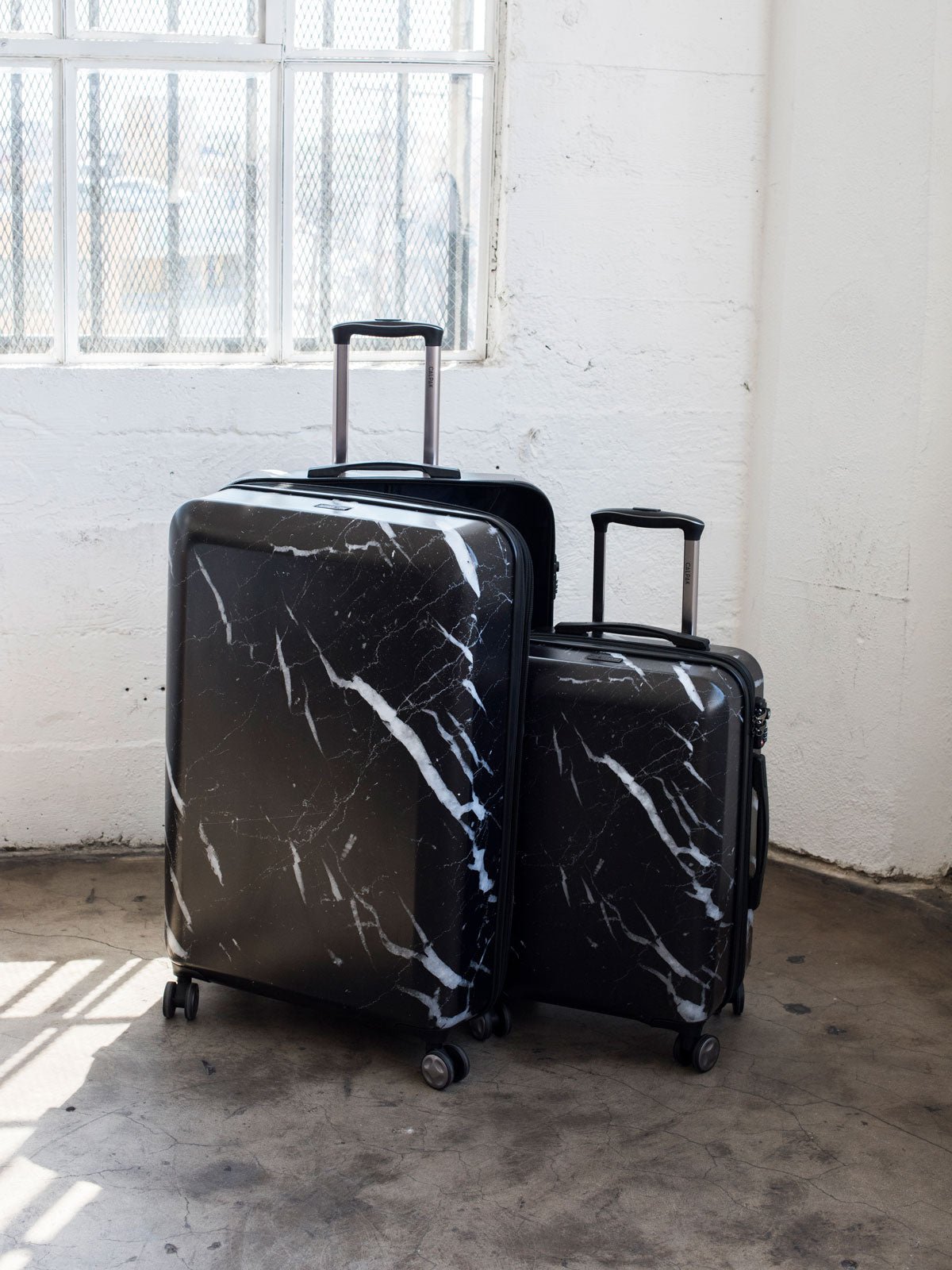 Astyll 3-piece luggage set in midnight marble with spinner wheels