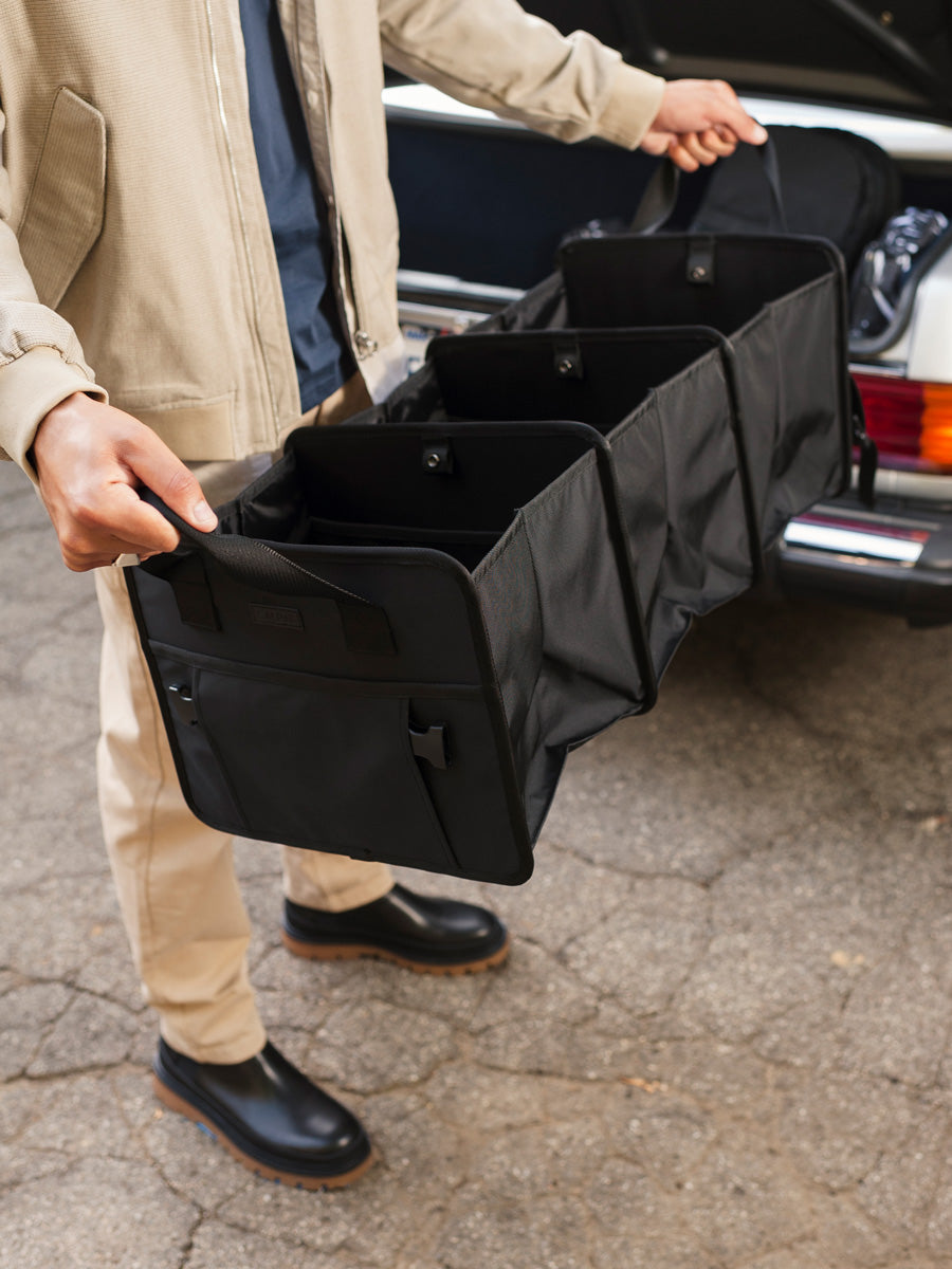 Car trunk organizer with carrying handles