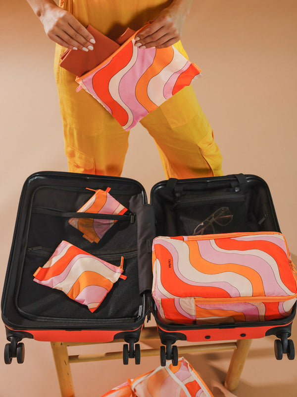 Orange and Pink CALPAK set of zippered pouches for luggage organization
