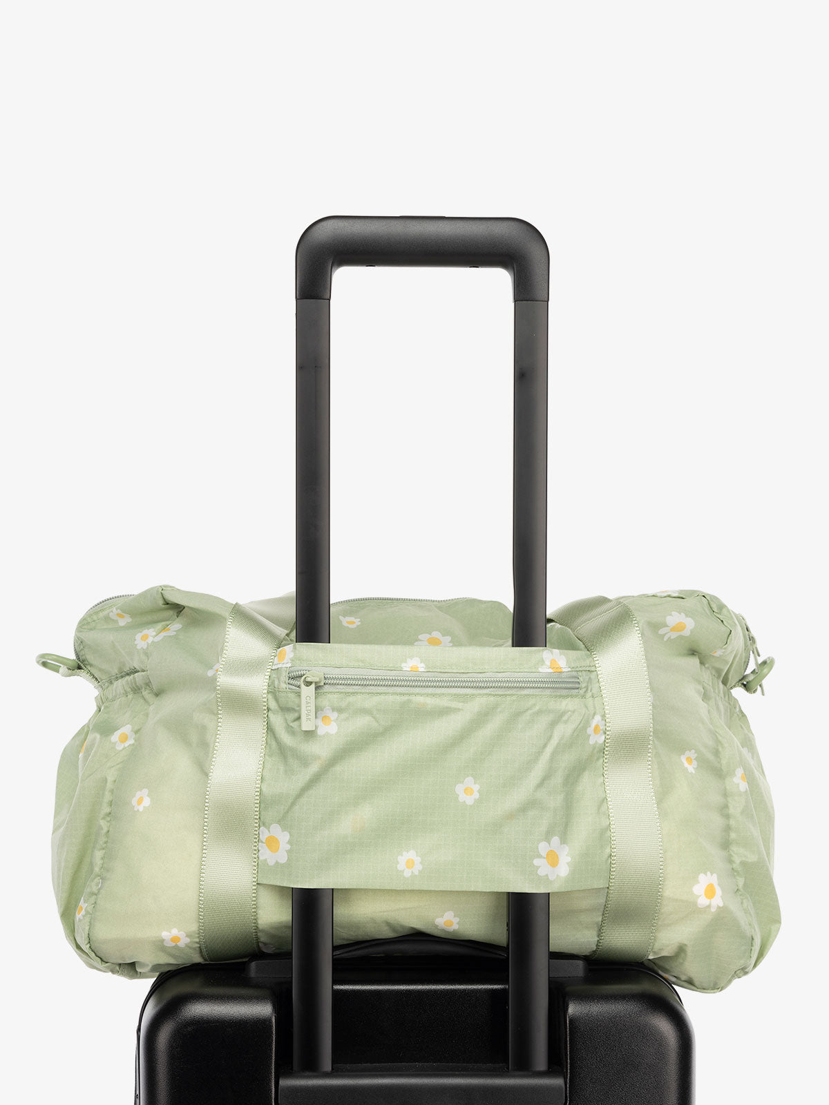 CALPAK Compakt nylon duffle bag with trolley sleeve in daisy