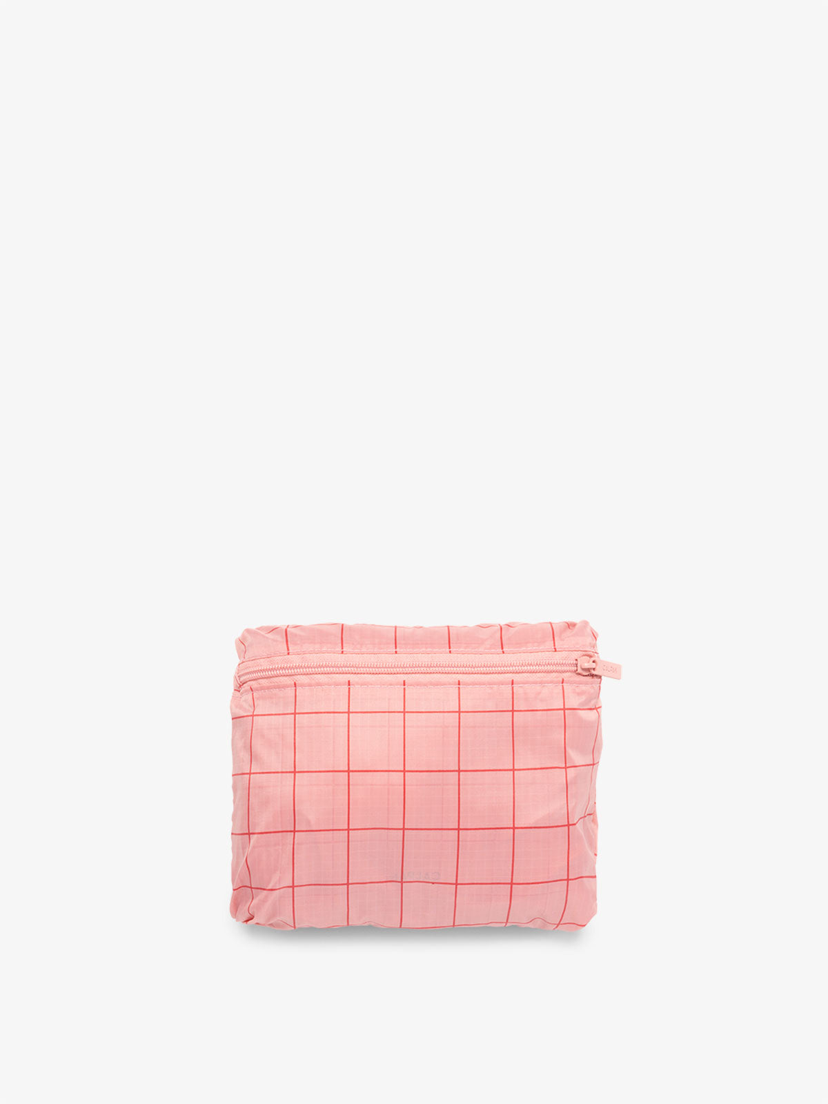 CALPAK Compakt foldable duffle bag for travel in pink grid